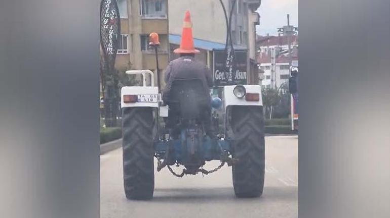 Bolu'da şaşkına çeviren manzara! Kafasına duba taktı... Traktörle trafikte ilerledi